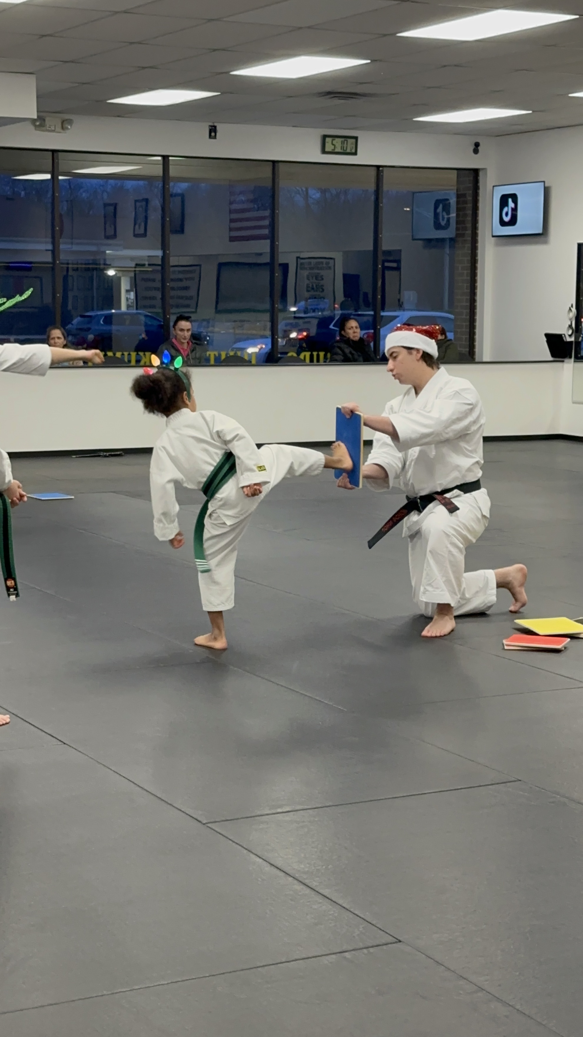 Liam attempting to break a board